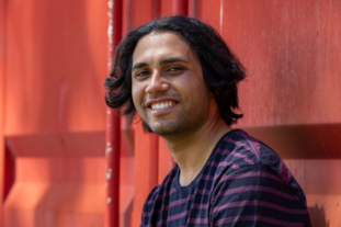 Young man smiling at camera